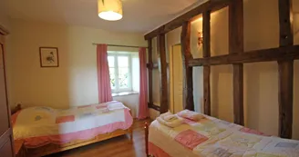Gite" La Feuillardière" à Champagnac La Riviere en Haute-Vienne, chambre en bas deux lits_23