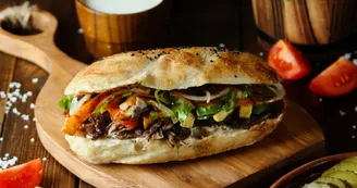 meat doner in the bread on wooden board
